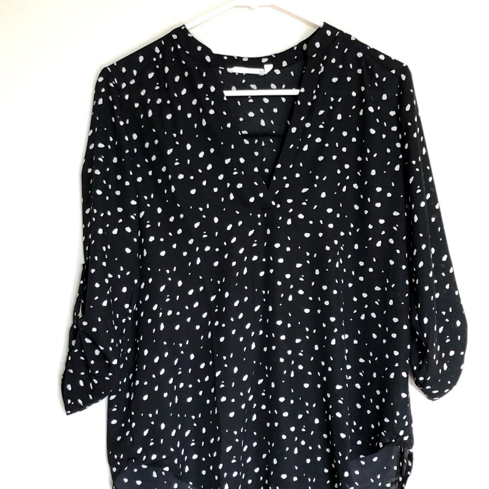 Small Lush black and white dotted blouse.